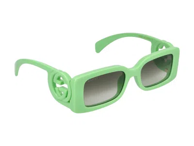 Shop Gucci Sunglasses In Green