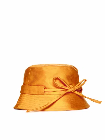 Shop Jacquemus Hats And Headbands In Darkorange