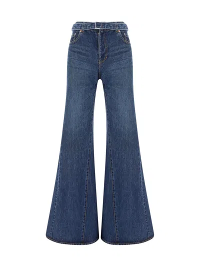 Shop Sacai Belted Flared Jeans In Blue