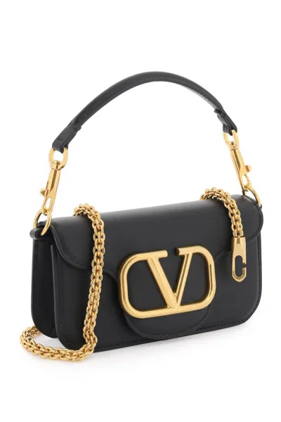 Shop Valentino Garavani Small Locò Shoulder Bag In 黑色的