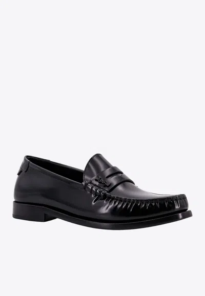 Shop Saint Laurent Cassandre Logo Leather Loafers In Black