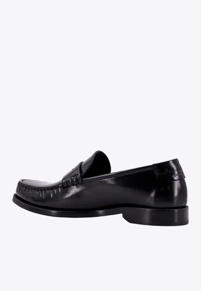 Shop Saint Laurent Cassandre Logo Leather Loafers In Black