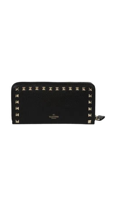 Shop Valentino Rockstud Zipper Wallet In Black