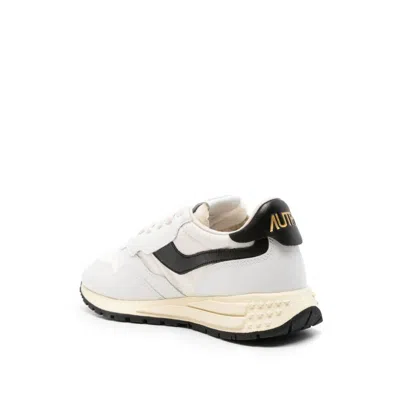 Shop Autry Sneakers In White/black