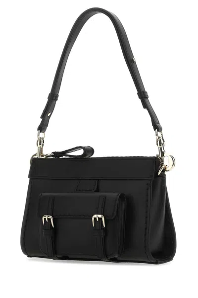 Shop Chloé Chloe Handbags. In Black