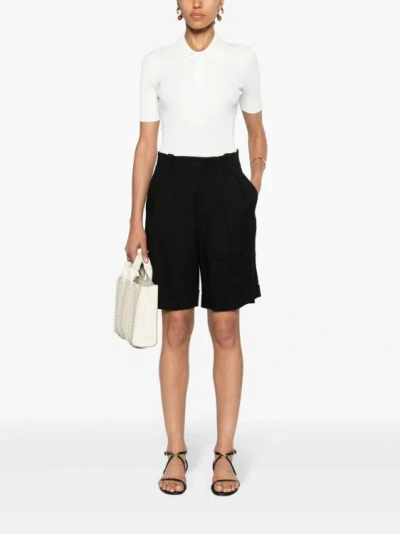 Shop Lorena Antoniazzi Pleat-detail Black Shorts