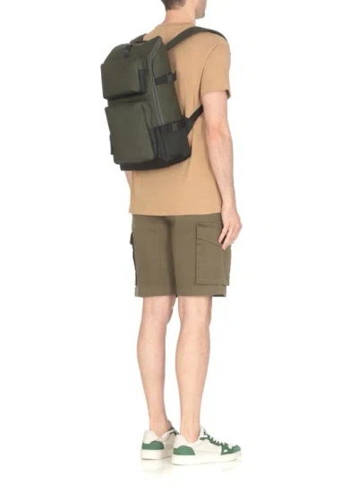Shop Rains Trail Cargo Backpack In Green