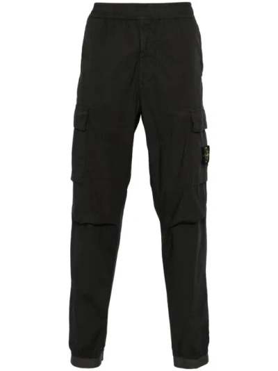 Shop Stone Island Compass-badge Tapered Leg Trousers In Black