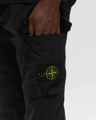 Shop Stone Island Compass-badge Tapered Leg Trousers In Black