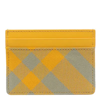 Shop Burberry Wallets In Yellow