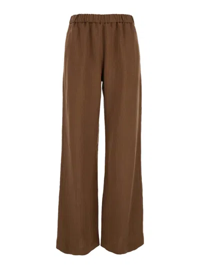 Shop Plain Brown Pants With Elastic Waistband In Fabric Woman