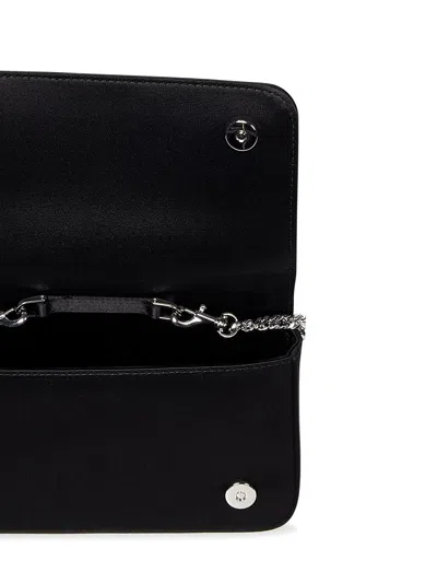 Shop Moschino Handbag In Black