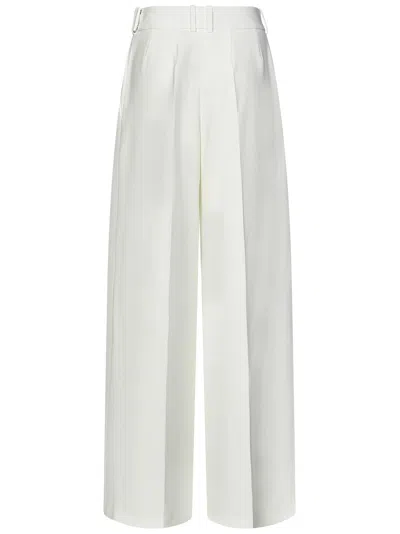 Shop Alexandre Vauthier Trousers In White