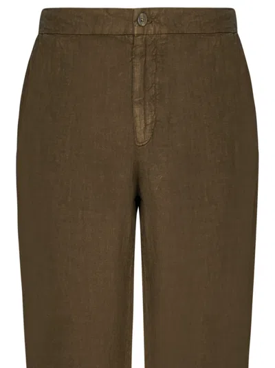 Shop Boglioli Trousers In Brown