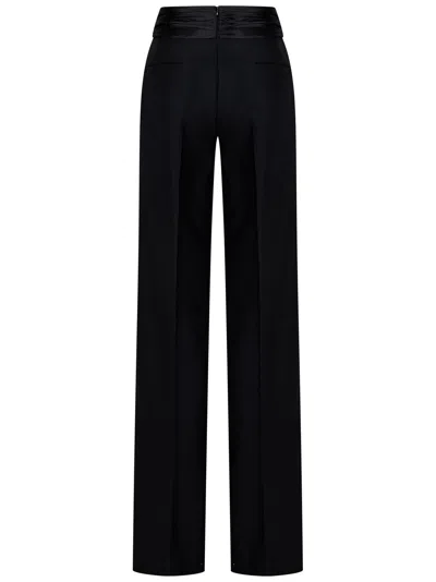 Shop Laquan Smith Trousers In Black