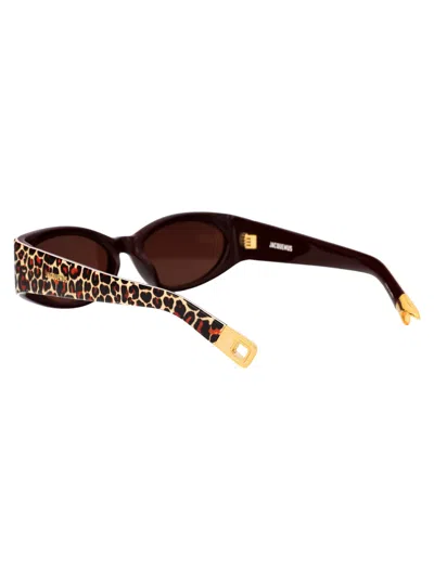 Shop Jacquemus Ovalo Sunglasses In 02 Leopard/ Yellow Gold/ Brown