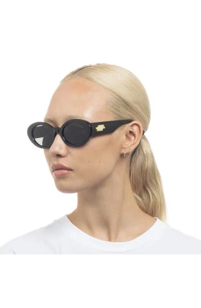 Shop Le Specs Nouveau Vie 50mm Oval Sunglasses In Black