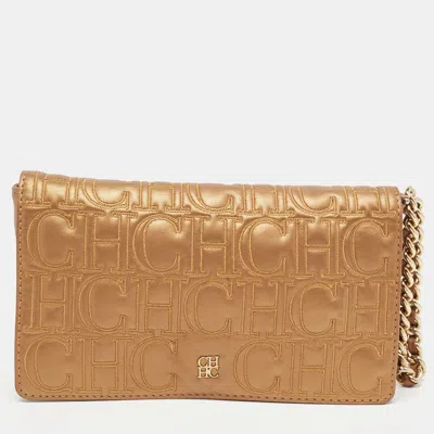 Shop Carolina Herrera Bronze Monogram Leather Wristlet Clutch In Brown
