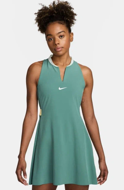 Shop Nike Club Dri-fit Racerback Dress In Bicoastal/ White