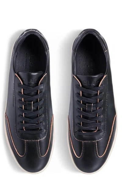 Shop Clae Deane Sneaker In Black Leather Raw Edge