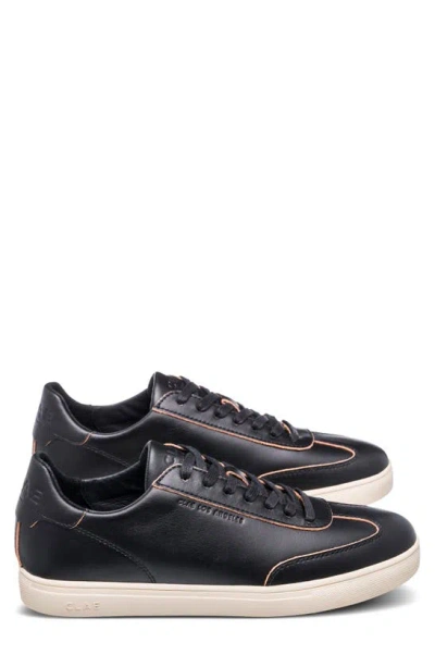 Shop Clae Deane Sneaker In Black Leather Raw Edge