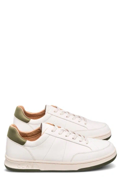 Shop Clae Monroe Sneaker In Off White Leather Olive