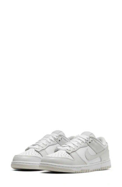 Nike Dunk Low Basketball Sneaker In White/photon Dust/white