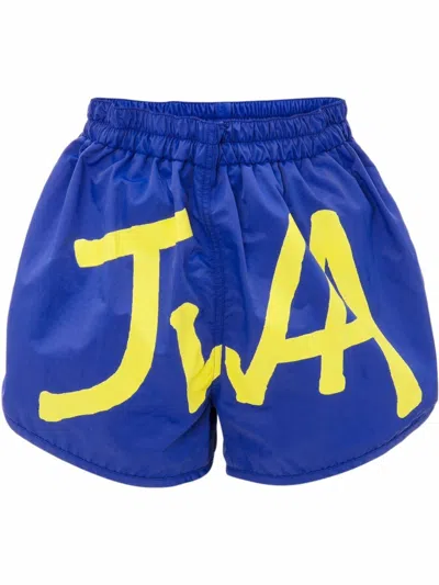 Shop Jw Anderson Logo-print Swim Shorts