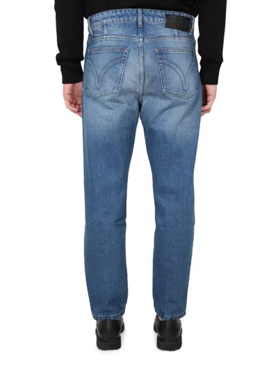 Shop Ami Alexandre Mattiussi Ami Paris Tapered Fit Jeans In Blue