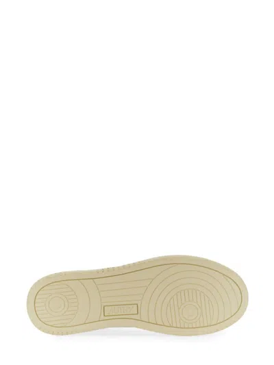 Shop Autry Medalist Low Sneaker In Ivory