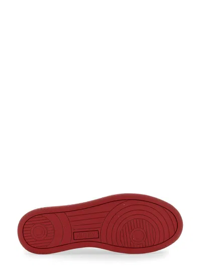 Shop Autry Medalist Low Sneaker In Red