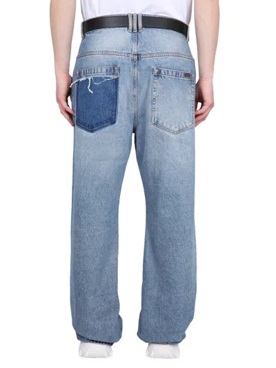 Shop Balmain Loose Fit Jeans In Blue