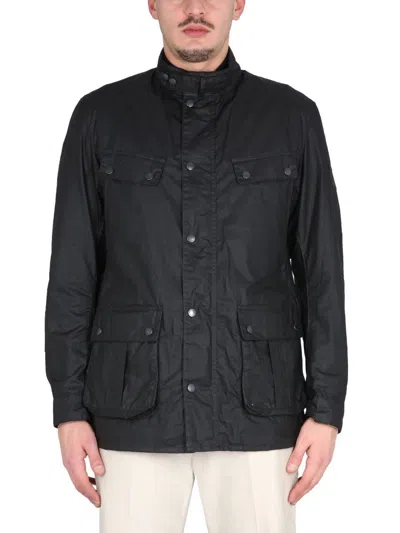 Shop Barbour Waxed Jacket In Black