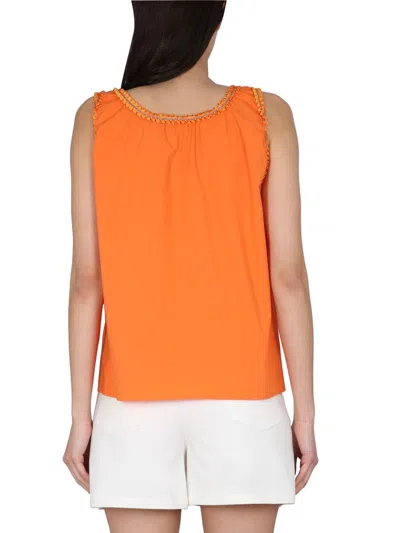 Shop Boutique Moschino Cotton Tops. In Orange