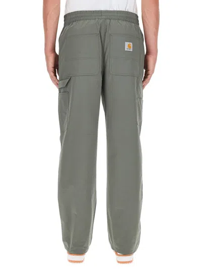 Shop Carhartt Wip Pants With Logo In Green