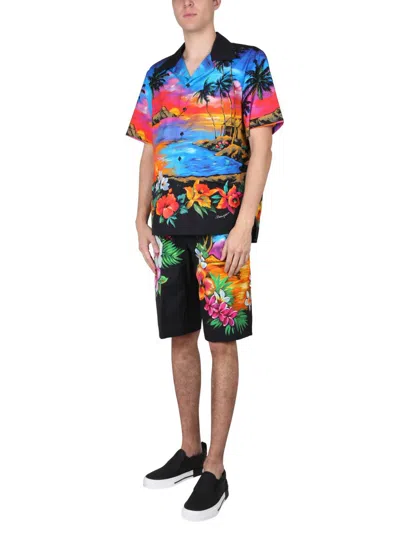 Shop Dolce & Gabbana Bermuda Shorts With Hawaii Print In Black