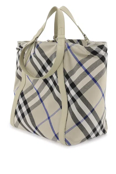Shop Burberry Ered Checkered Tote In Brown