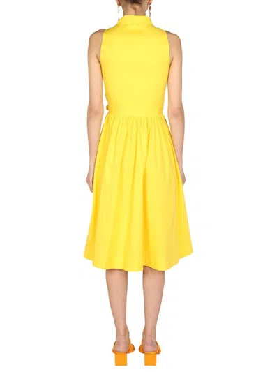 Shop Moschino Heart Pockets Dress In Yellow
