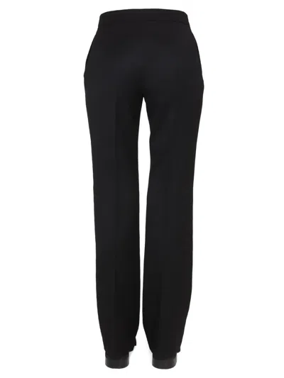 Shop Moschino Wool Grain De Poudre Pants In Black