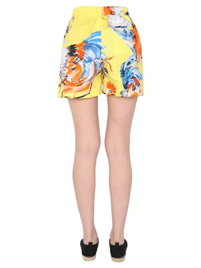 Shop Msgm Printed Shorts In Yellow
