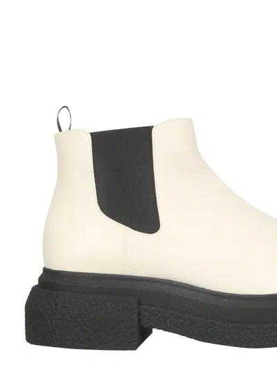 Stuart Weitzman Round Head Design And Ankle Boots In Beige