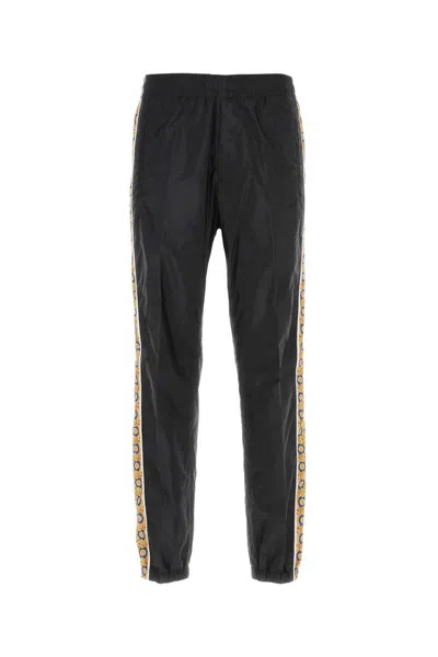 Shop Versace Jogging Pants With Baroque Print In Black