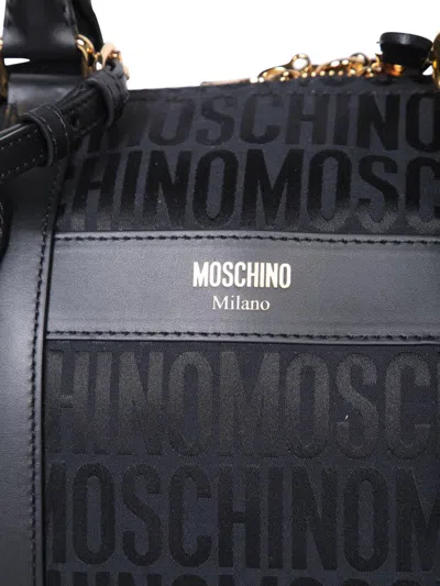 Shop Moschino Travel Bag In Black