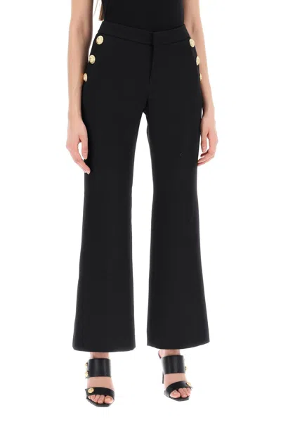 Shop Balmain Flared Pants With Embossed Buttons Women In Multicolor