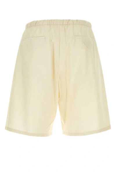 Shop Prada Man Passtel Yellow Cotton Bermuda Shorts