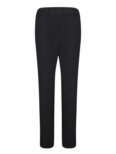 Shop Issey Miyake Trousers In Black