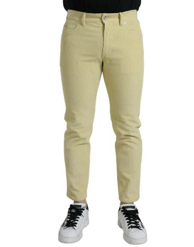 Shop Dolce & Gabbana Yellow Corduroy Logo Plaque Skinny Denim Jeans