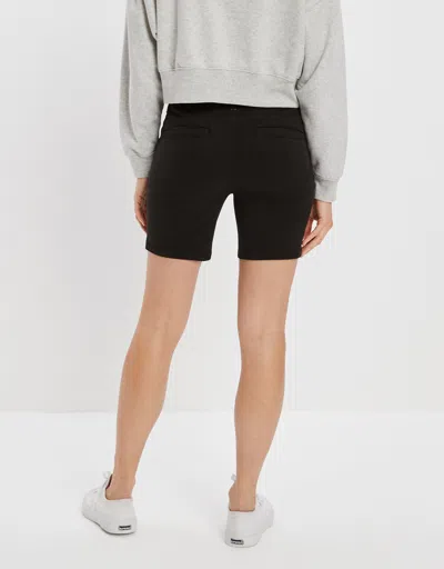 Shop American Eagle Outfitters Ae Stretch Khaki Skinny Bermuda Short In Black
