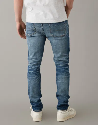Shop American Eagle Outfitters Ae Airflex+ Patched Slim Jean In Multi