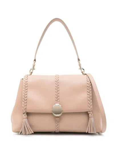 Shop Chloé Penelope Leather Shoulder Bag In Beige